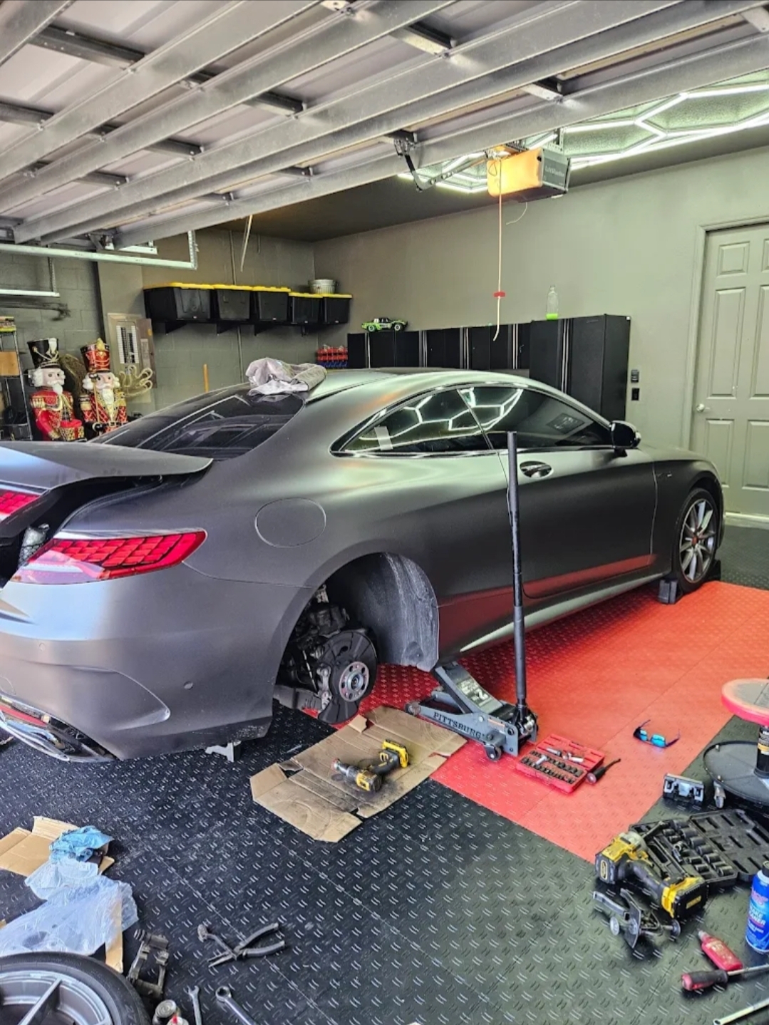 Tom's Brake Service working on a Mercedes